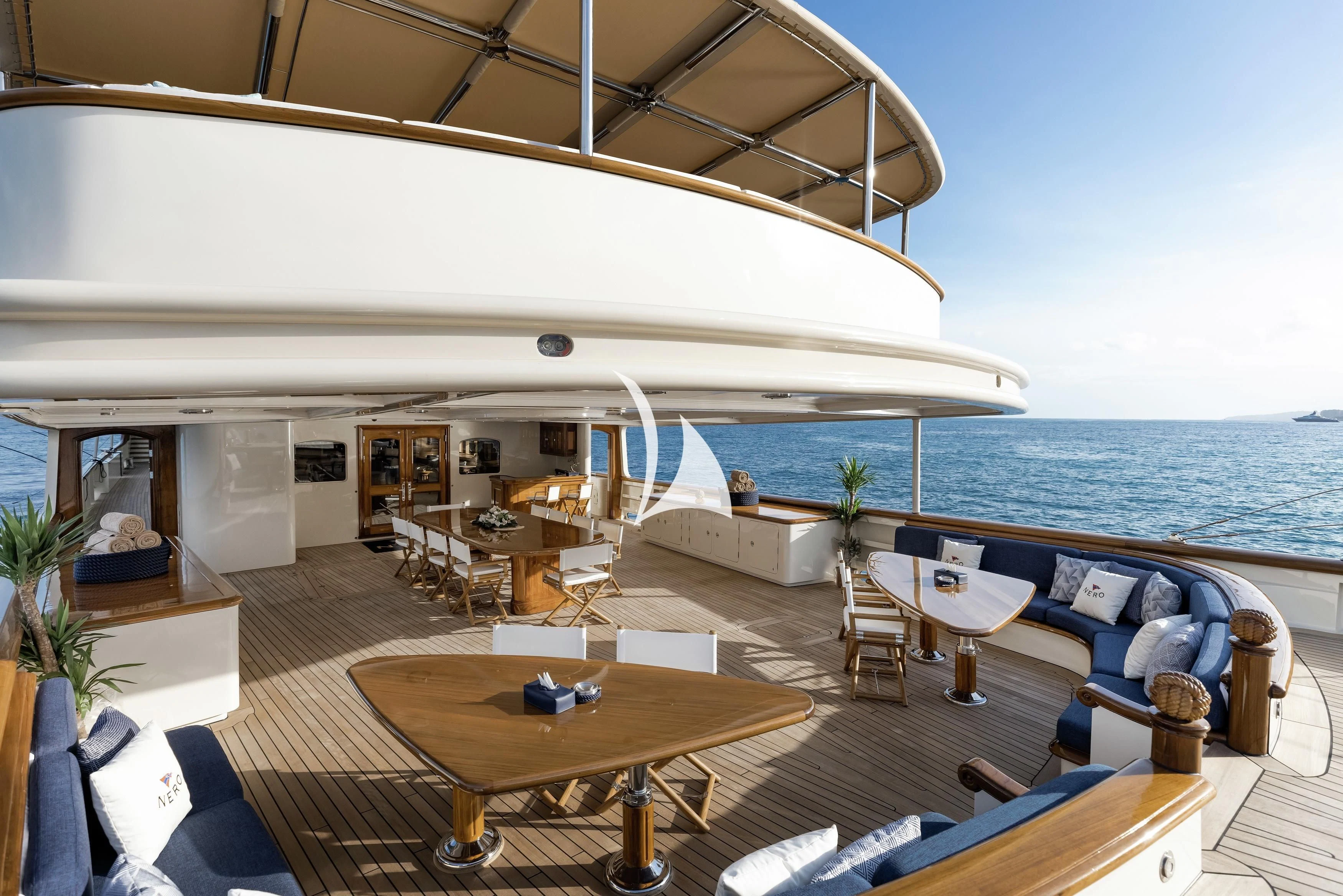 a large white boat on a body of water aboard NERO Yacht for Sale