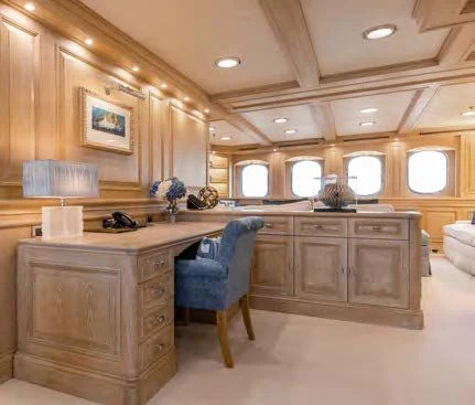 a kitchen with a large island aboard NERO Yacht for Sale