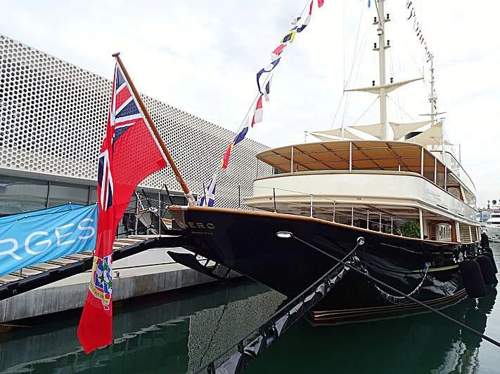 a boat with a flag on it aboard NERO Yacht for Sale