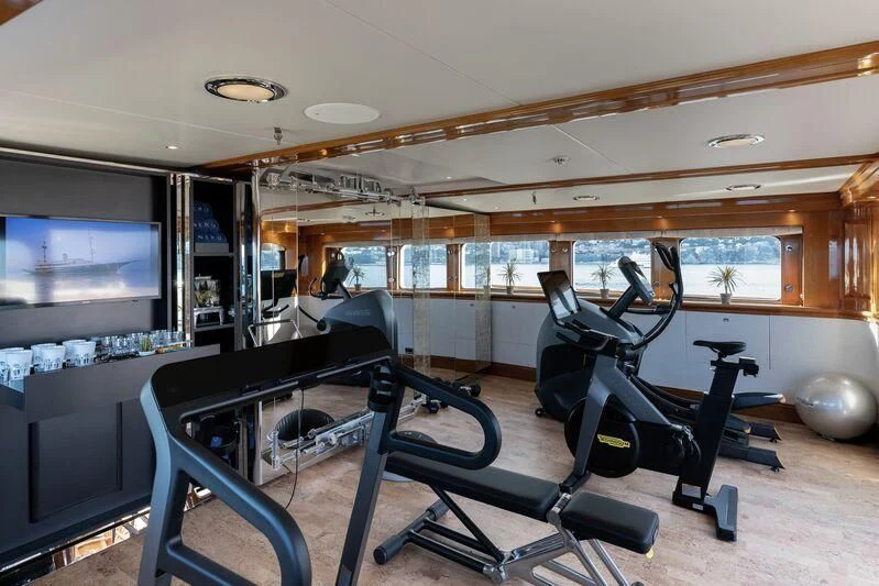 a gym with exercise equipment aboard NERO Yacht for Sale