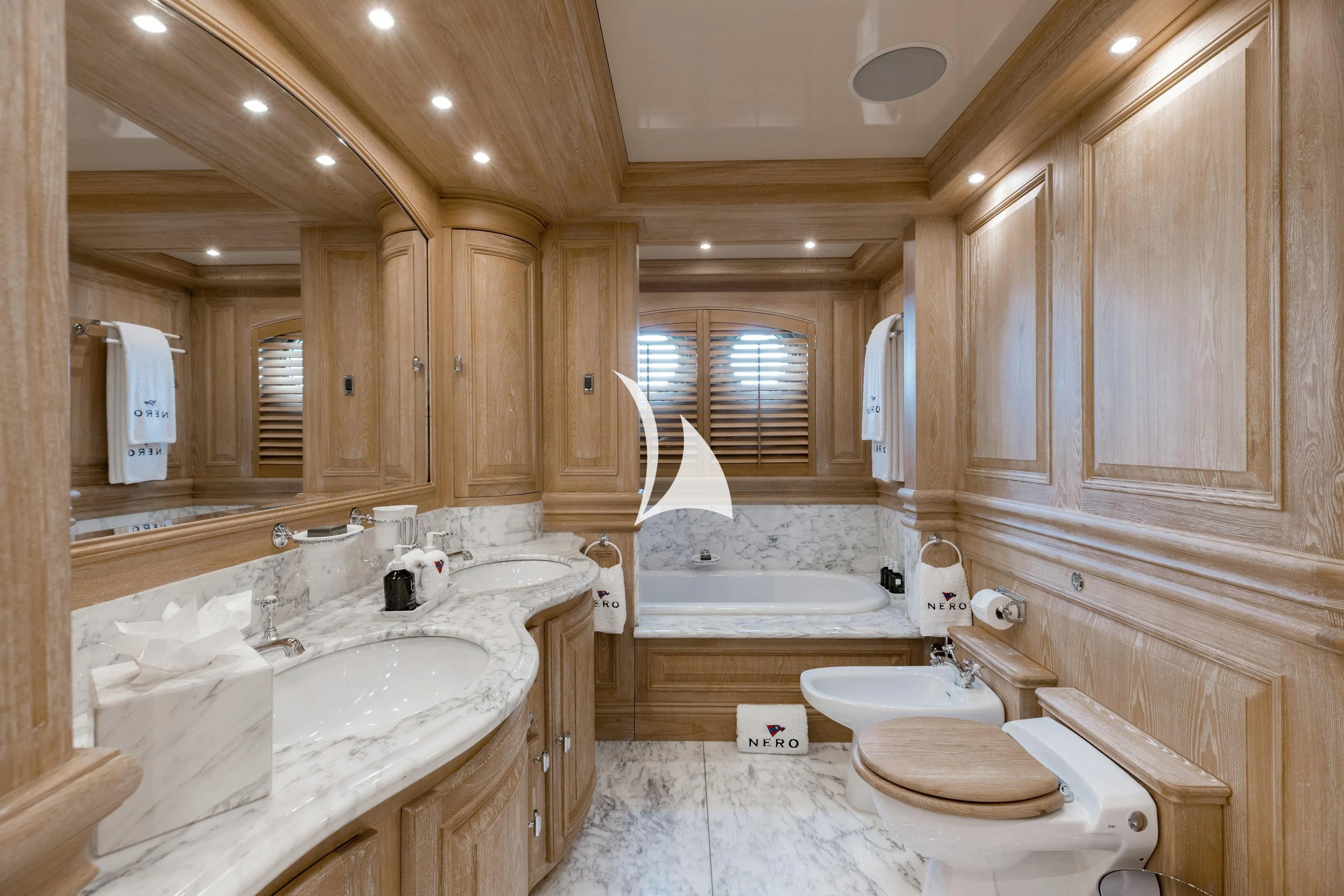 a bathroom with a large tub aboard NERO Yacht for Sale