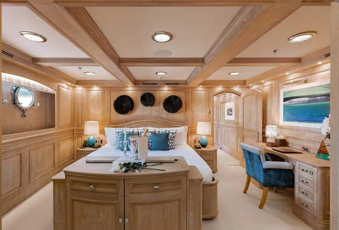 a large bedroom with a large bed aboard NERO Yacht for Sale