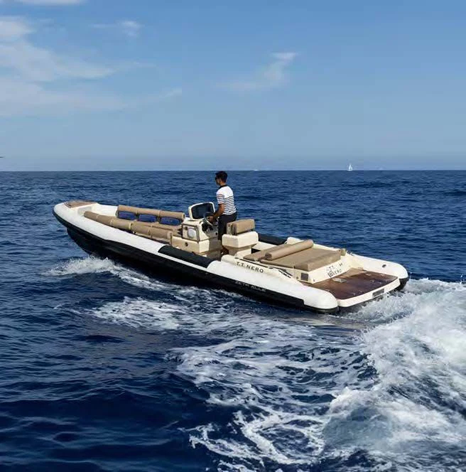 a man on a boat aboard NERO Yacht for Sale