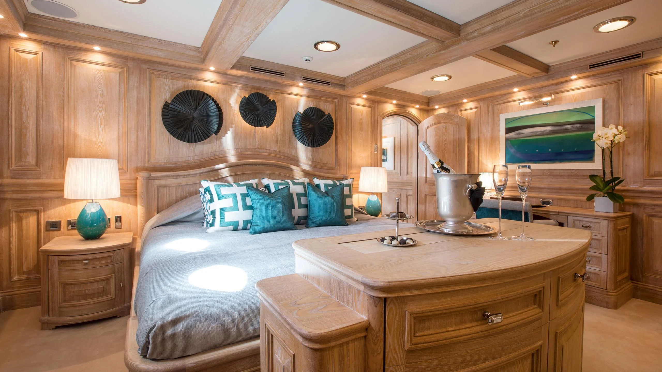 a room with a bed and a desk aboard NERO Yacht for Sale