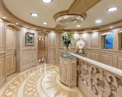 a large room with a marble floor aboard NERO Yacht for Sale