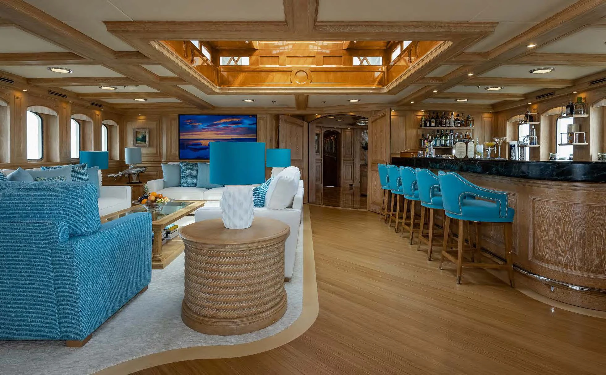 a large room with a couch and chairs aboard NERO Yacht for Sale