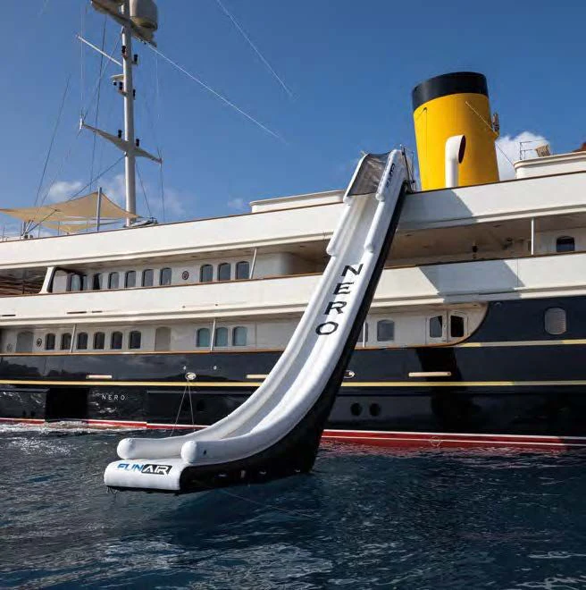 a large white boat on the water aboard NERO Yacht for Sale