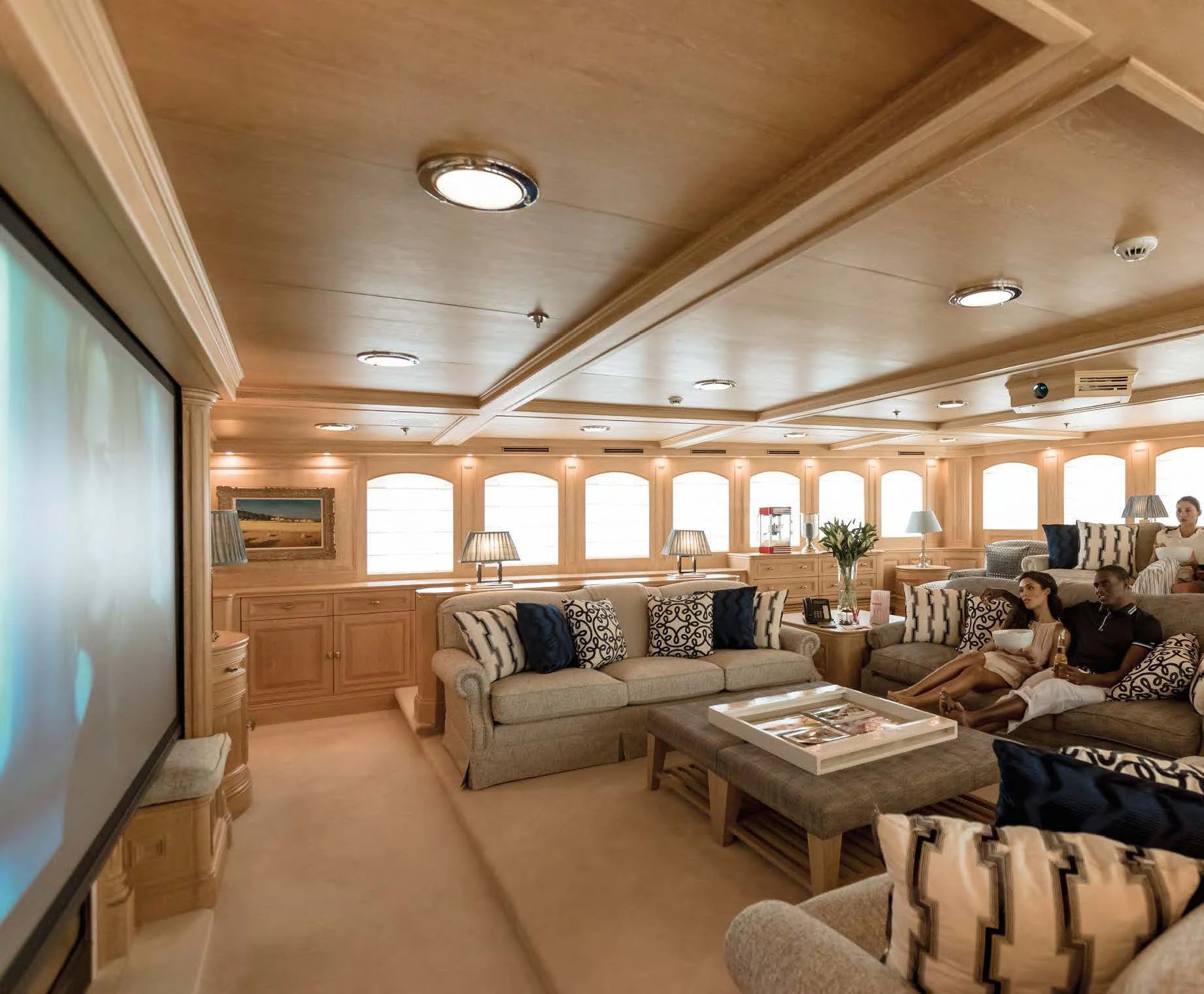 people sitting in a room aboard NERO Yacht for Sale