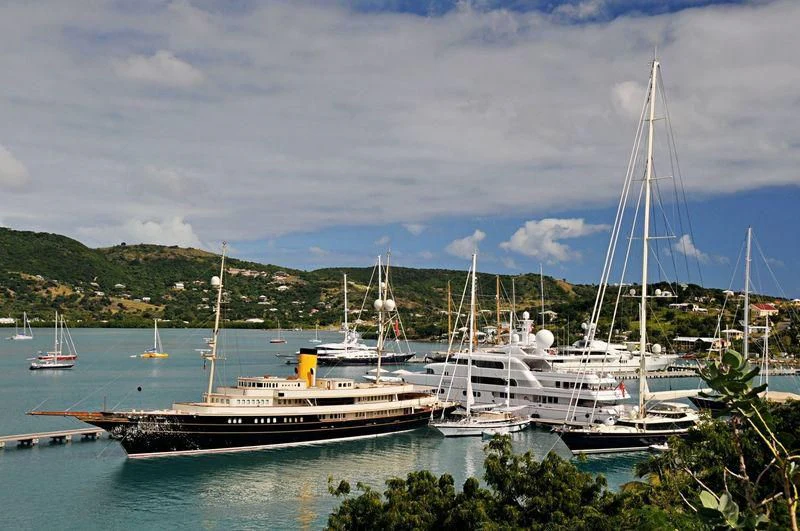 a group of boats in a harbor aboard NERO Yacht for Sale