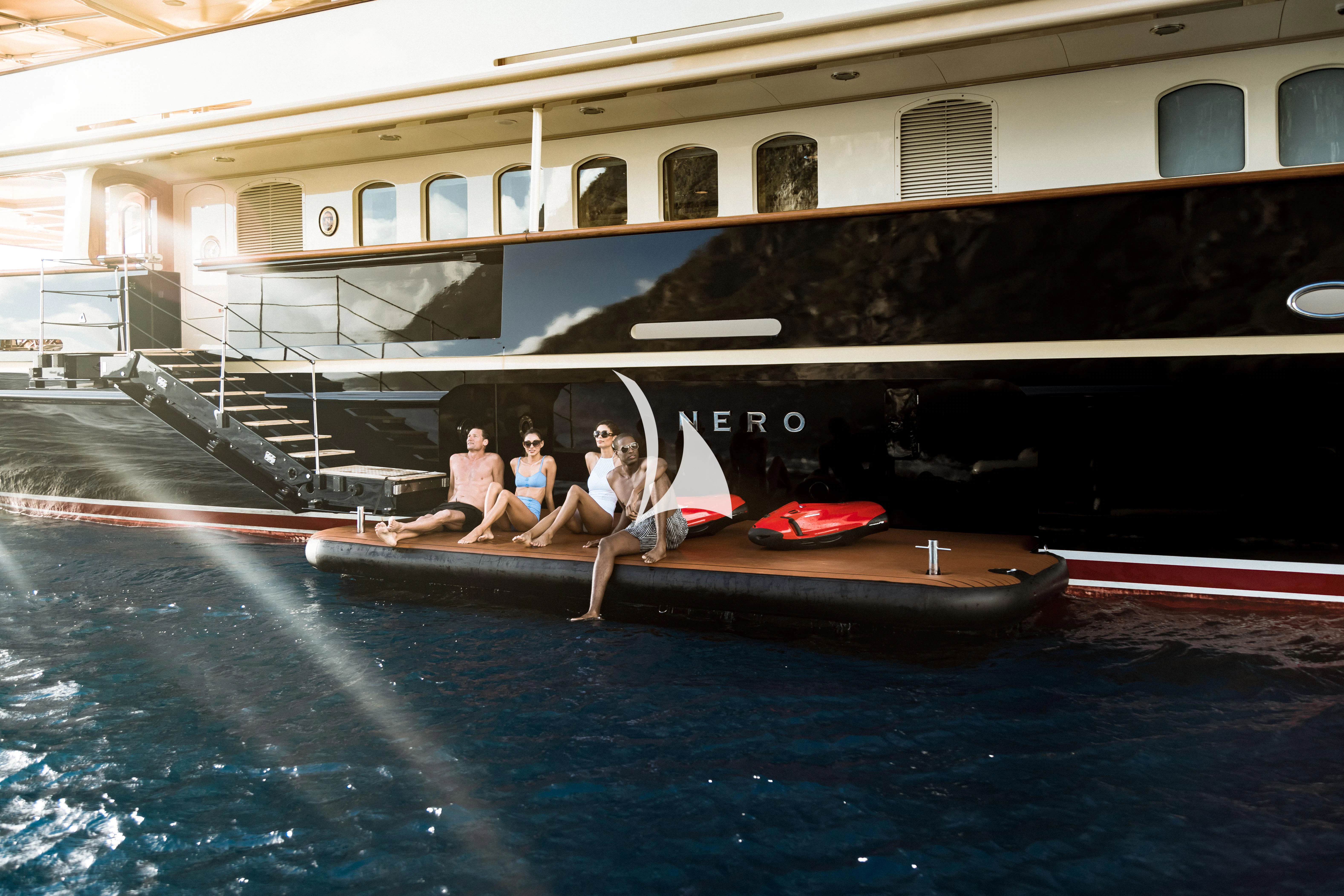 a group of people on a boat aboard NERO Yacht for Sale