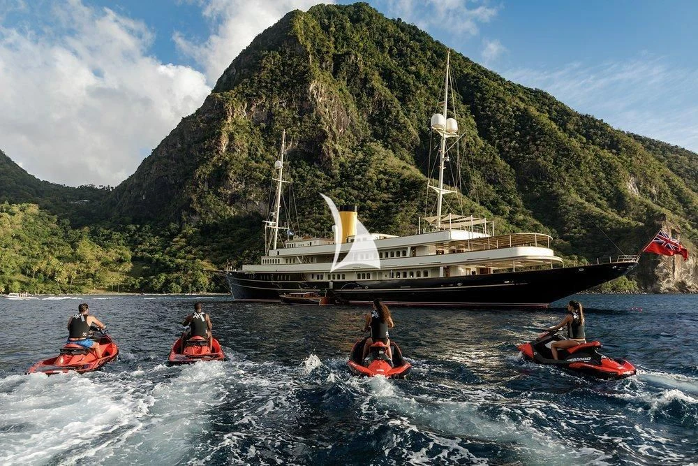 a group of people in kayaks in a body of water aboard NERO Yacht for Sale