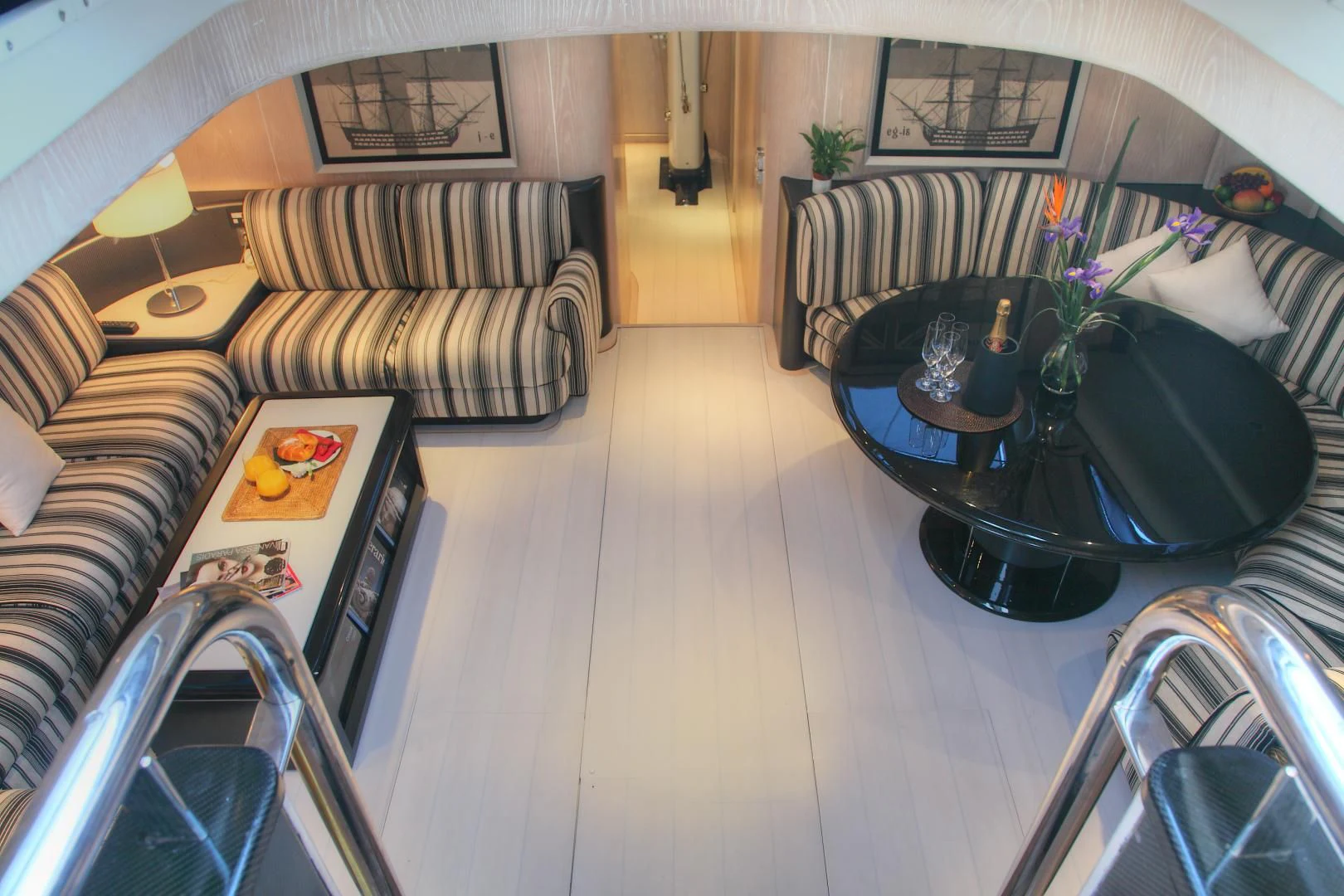 a living room with a couch and a coffee table aboard MARIA ALBA II Yacht for Sale