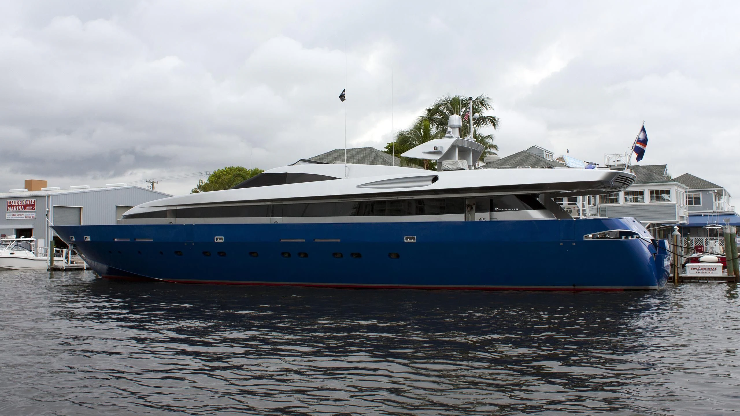 a large blue boat in the water aboard BELLISSIMA Yacht for Sale