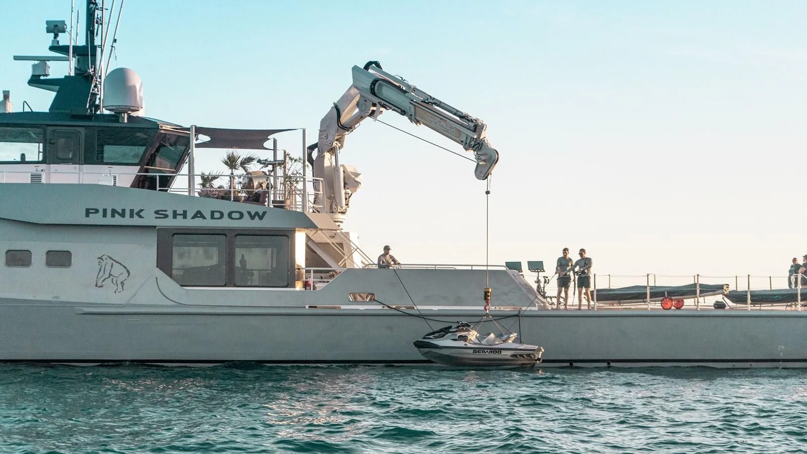 a large boat with a satellite dish on the deck aboard BAD COMPANY SUPPORT Yacht for Charter