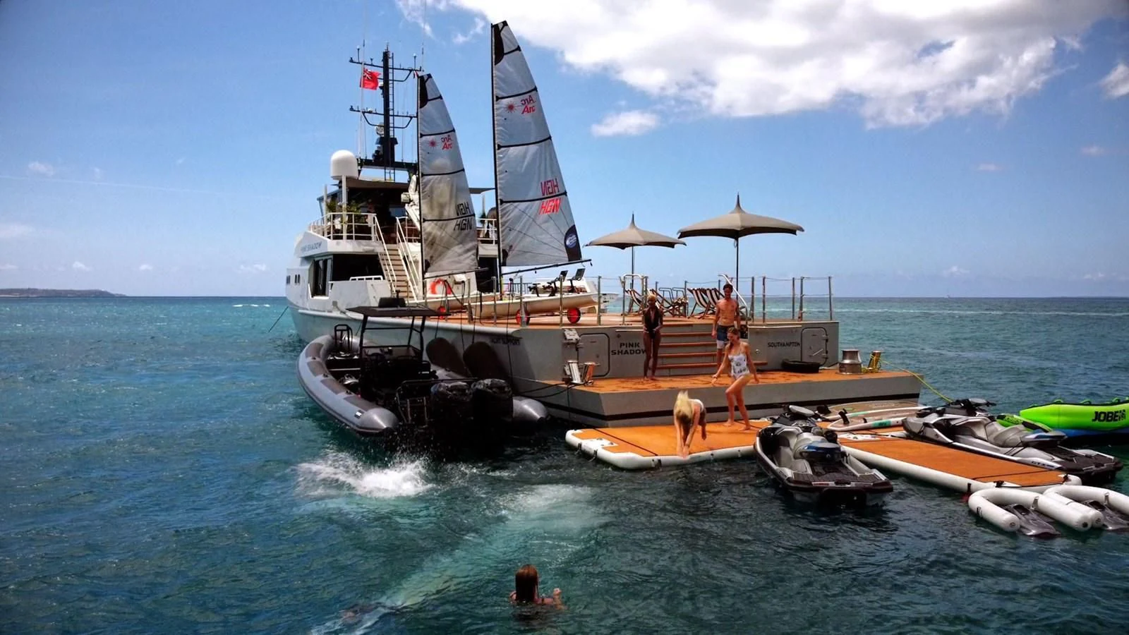 a boat with people on it aboard BAD COMPANY SUPPORT Yacht for Charter