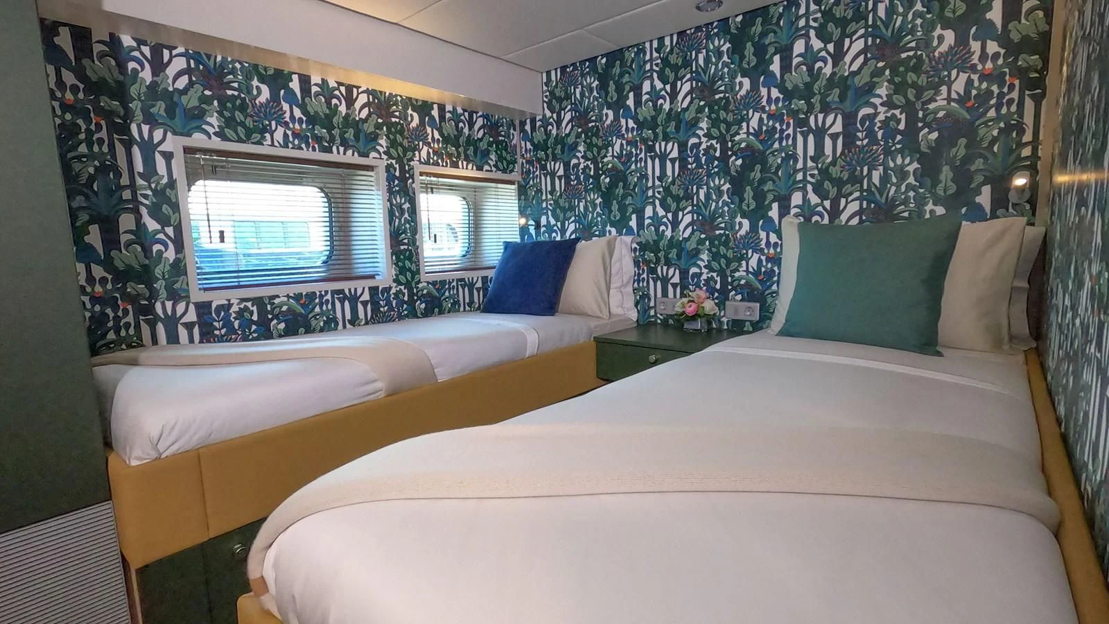 a couple of beds in a room aboard BAD COMPANY SUPPORT Yacht for Charter