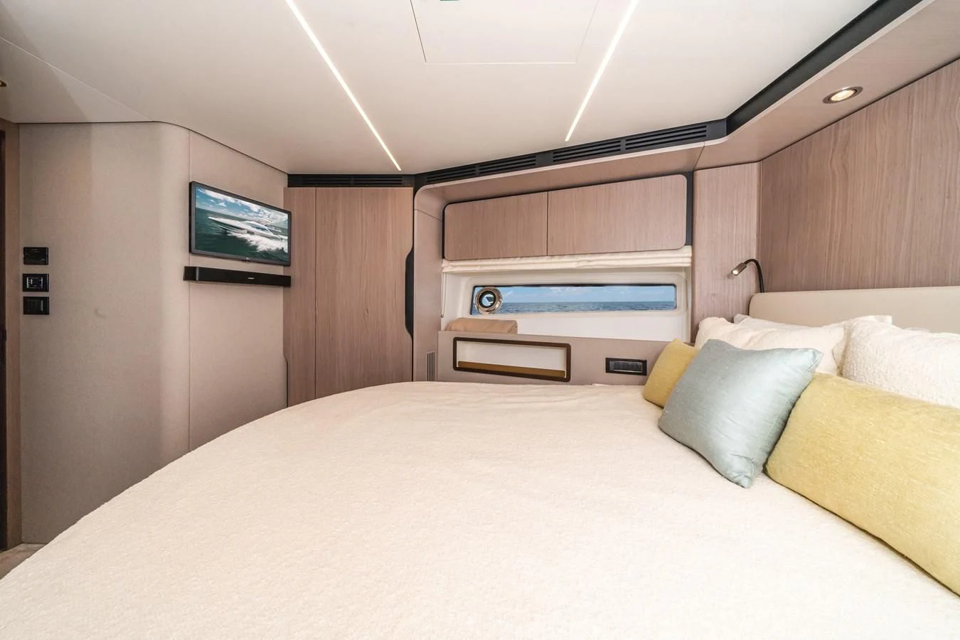a bed in a room aboard 2022 AZIMUT 72 FLYBRIDGE OUR TRADE Yacht for Sale