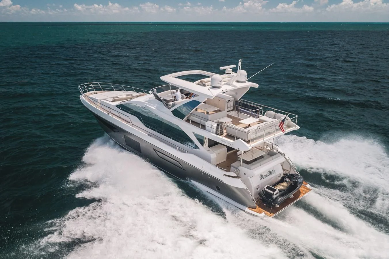 a boat on the water aboard 2022 AZIMUT 72 FLYBRIDGE OUR TRADE Yacht for Sale