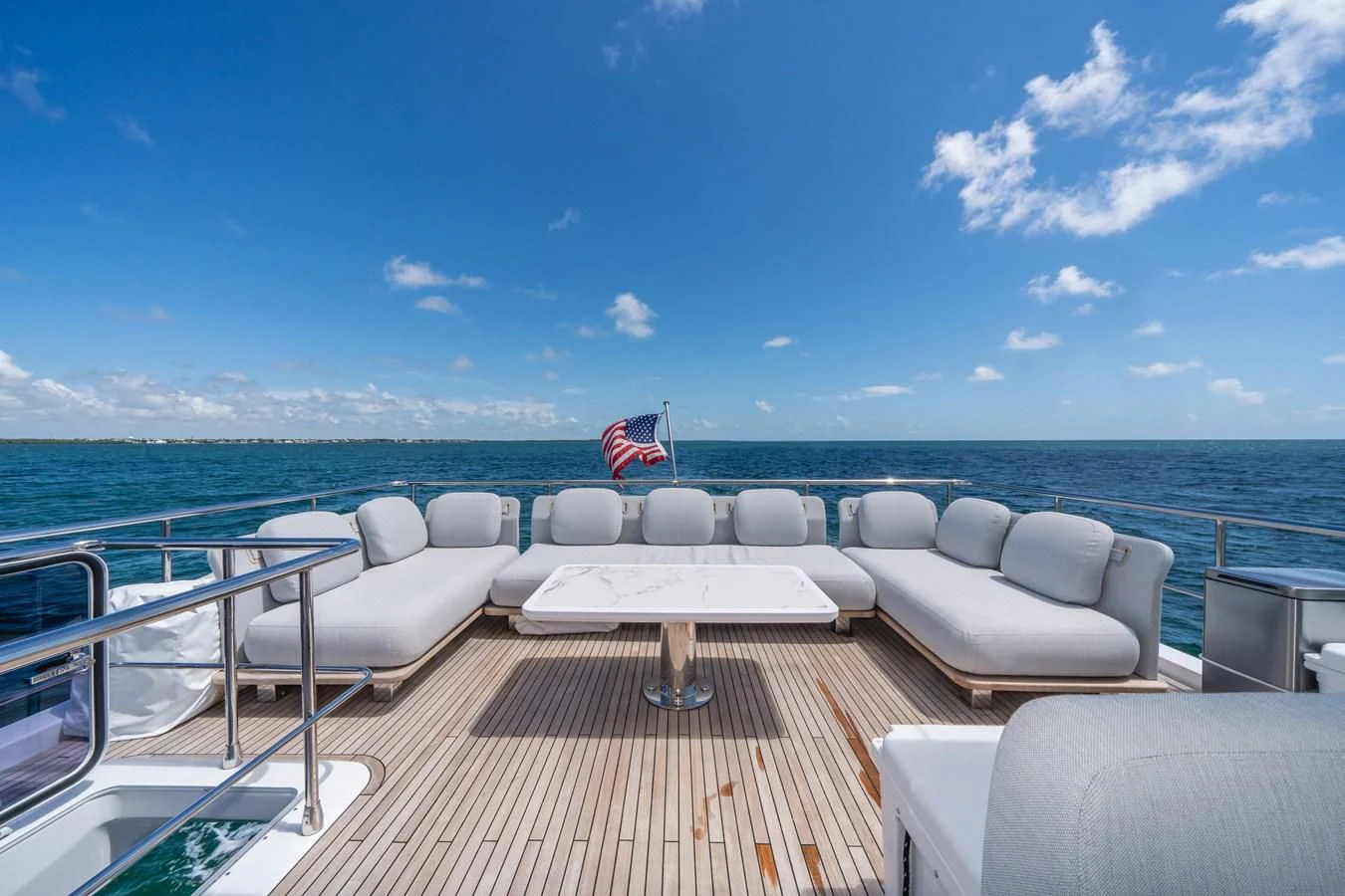 a boat on the water aboard 2022 AZIMUT 72 FLYBRIDGE OUR TRADE Yacht for Sale
