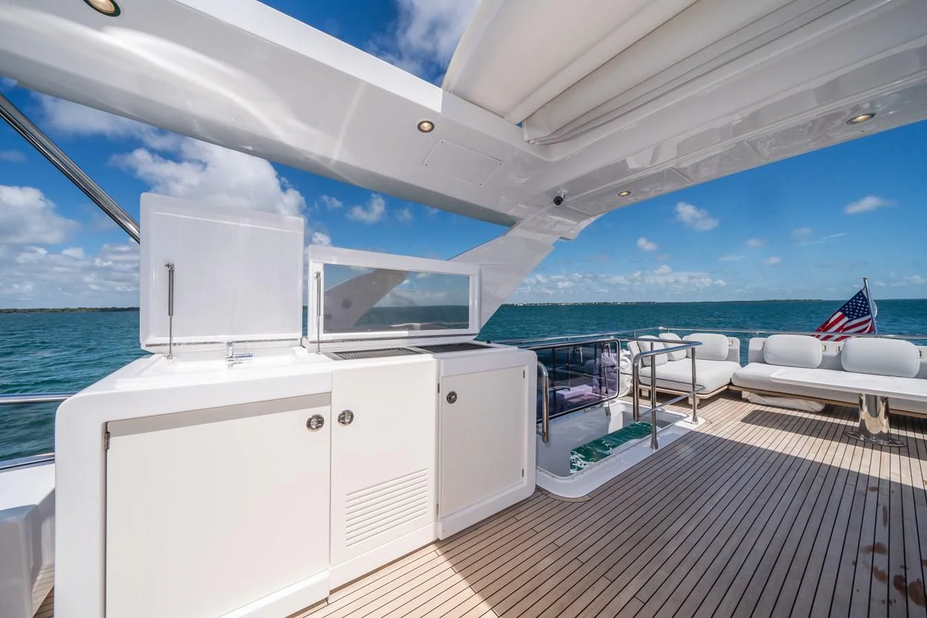 a boat on the water aboard 2022 AZIMUT 72 FLYBRIDGE OUR TRADE Yacht for Sale