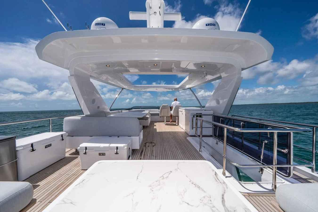 a boat on the water aboard 2022 AZIMUT 72 FLYBRIDGE OUR TRADE Yacht for Sale