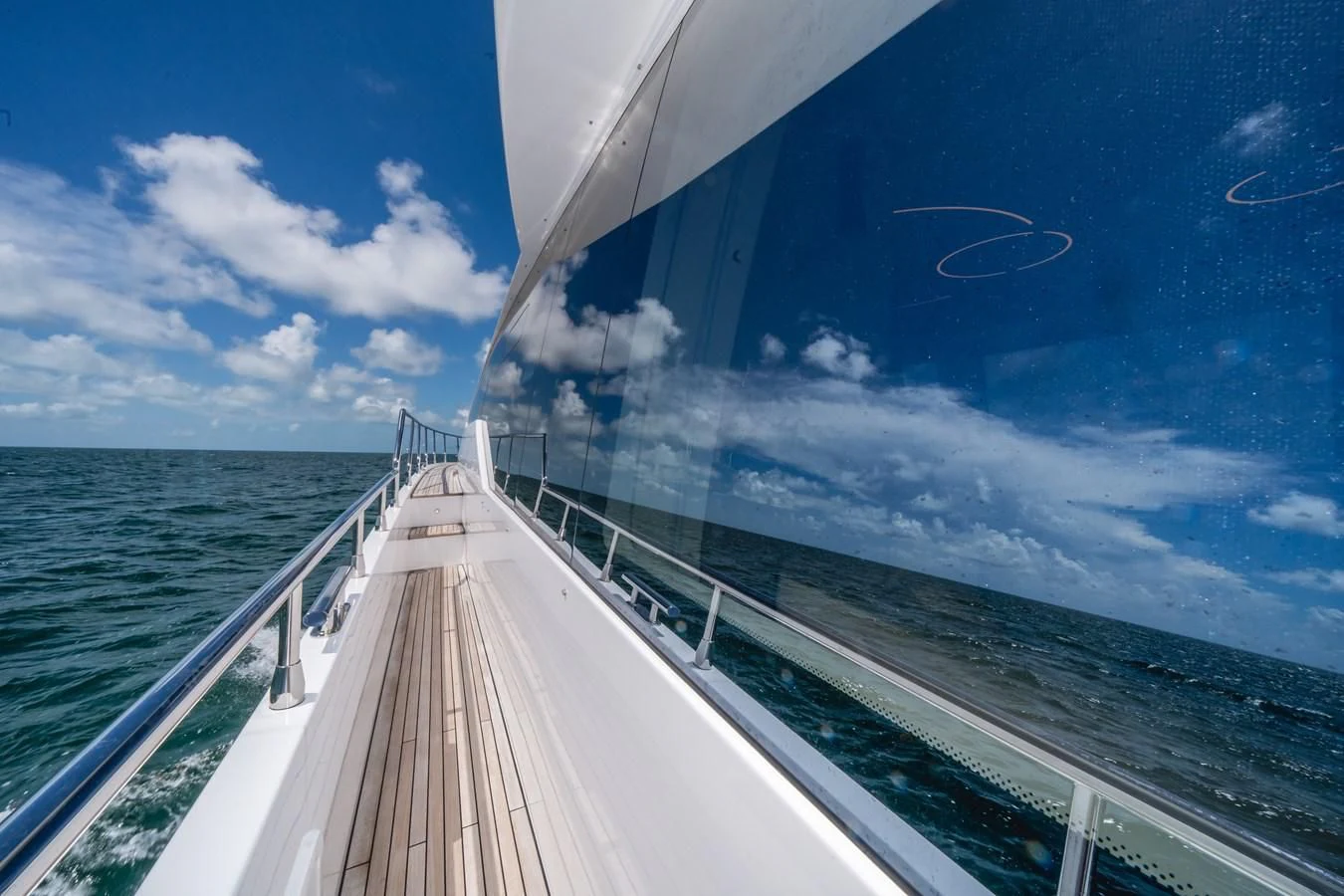 a long dock over the ocean aboard 2022 AZIMUT 72 FLYBRIDGE OUR TRADE Yacht for Sale