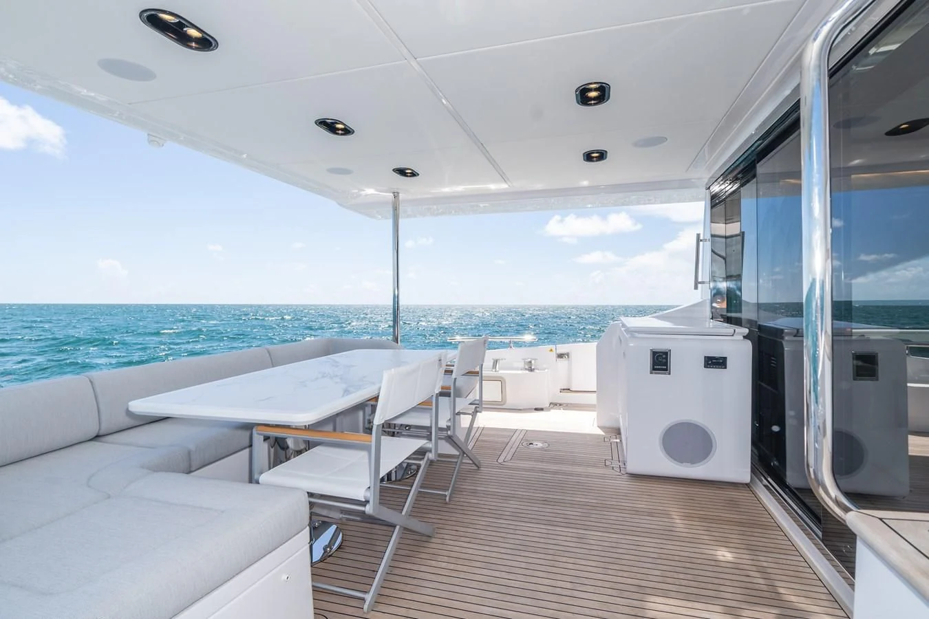 a boat on the water aboard 2022 AZIMUT 72 FLYBRIDGE OUR TRADE Yacht for Sale