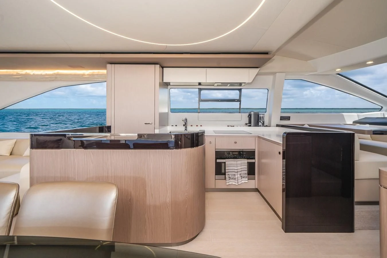 a kitchen with a large window aboard 2022 AZIMUT 72 FLYBRIDGE OUR TRADE Yacht for Sale