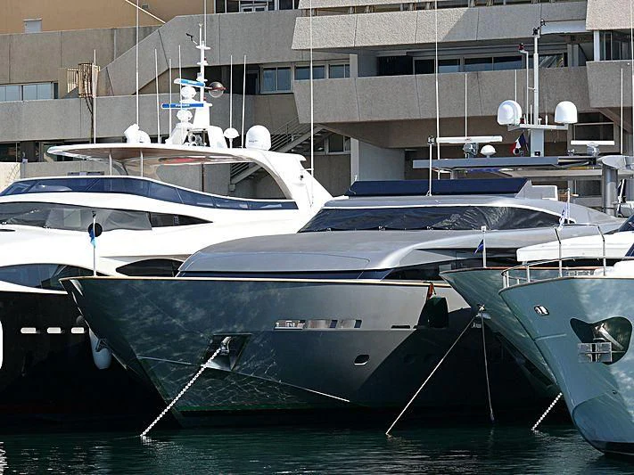 a row of boats in a harbor aboard VELVET Yacht for Sale