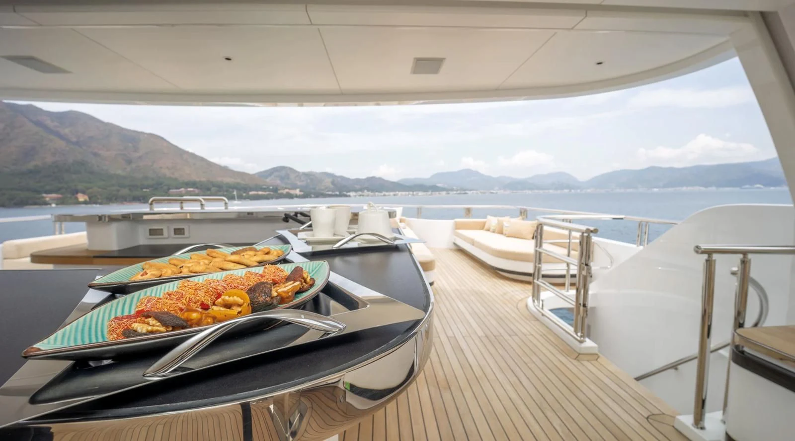 a plate of food on a table aboard M 47 Yacht for Sale