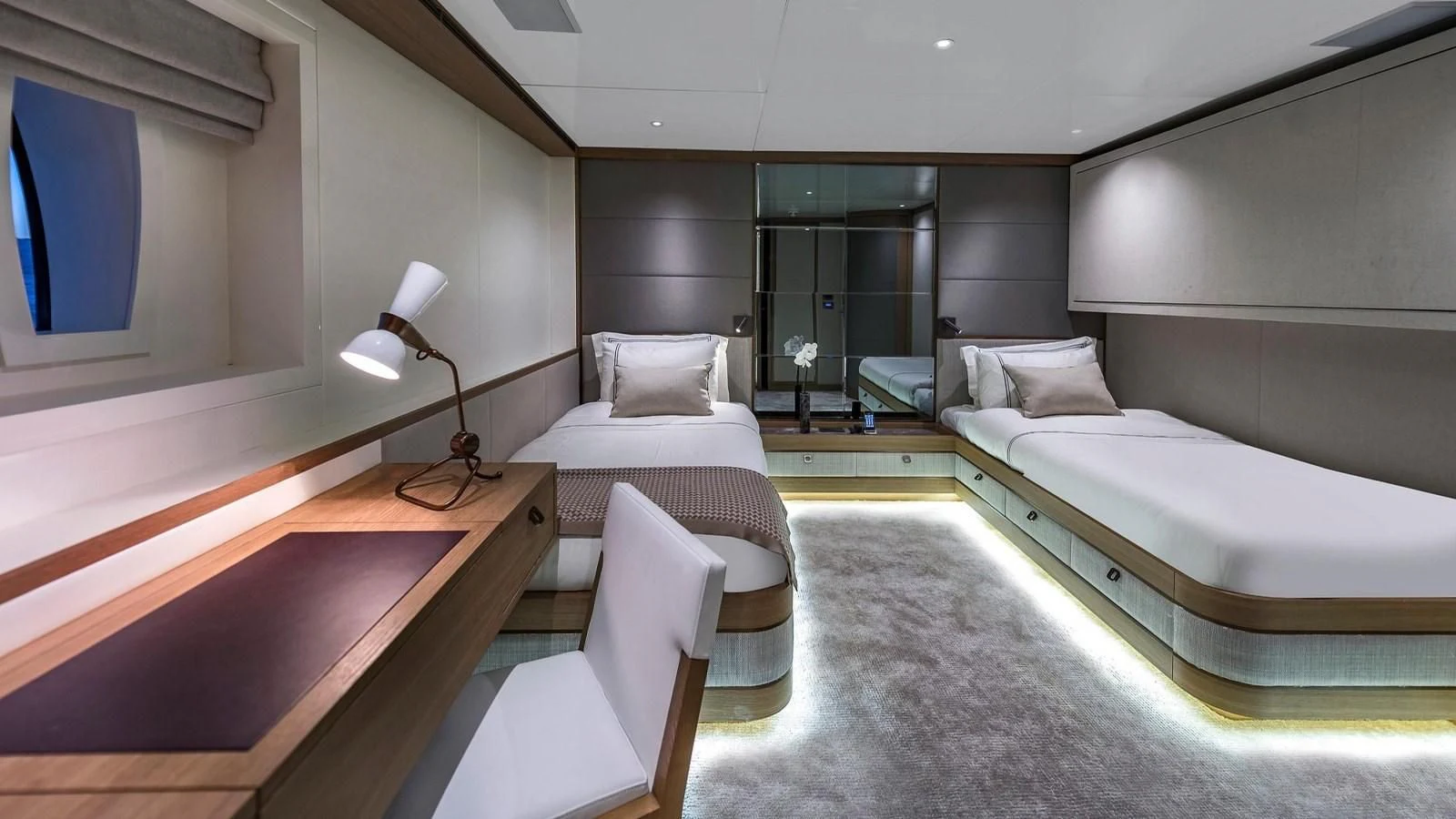a room with a bed and a desk aboard M 47 Yacht for Sale