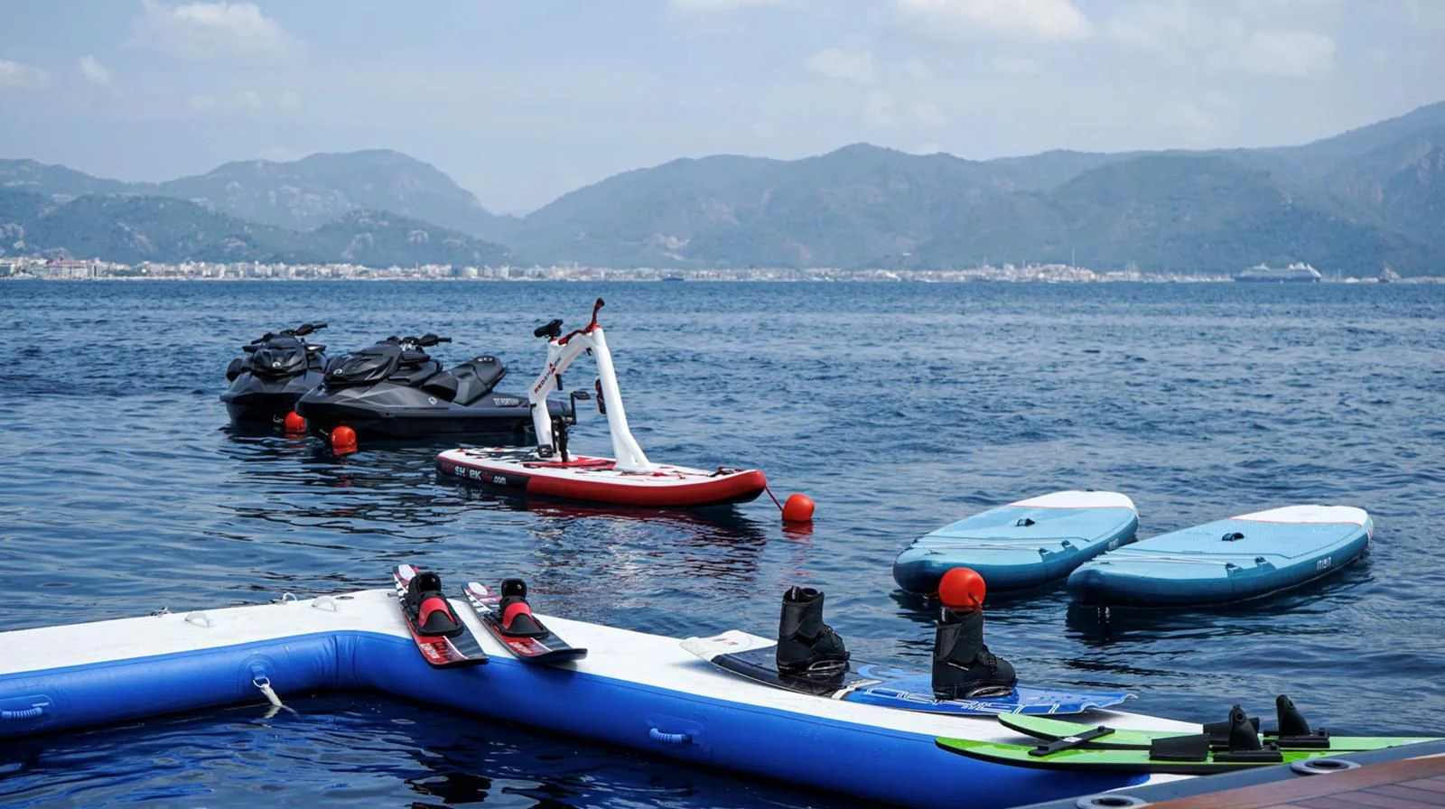 a group of people in boats in the water aboard M 47 Yacht for Sale