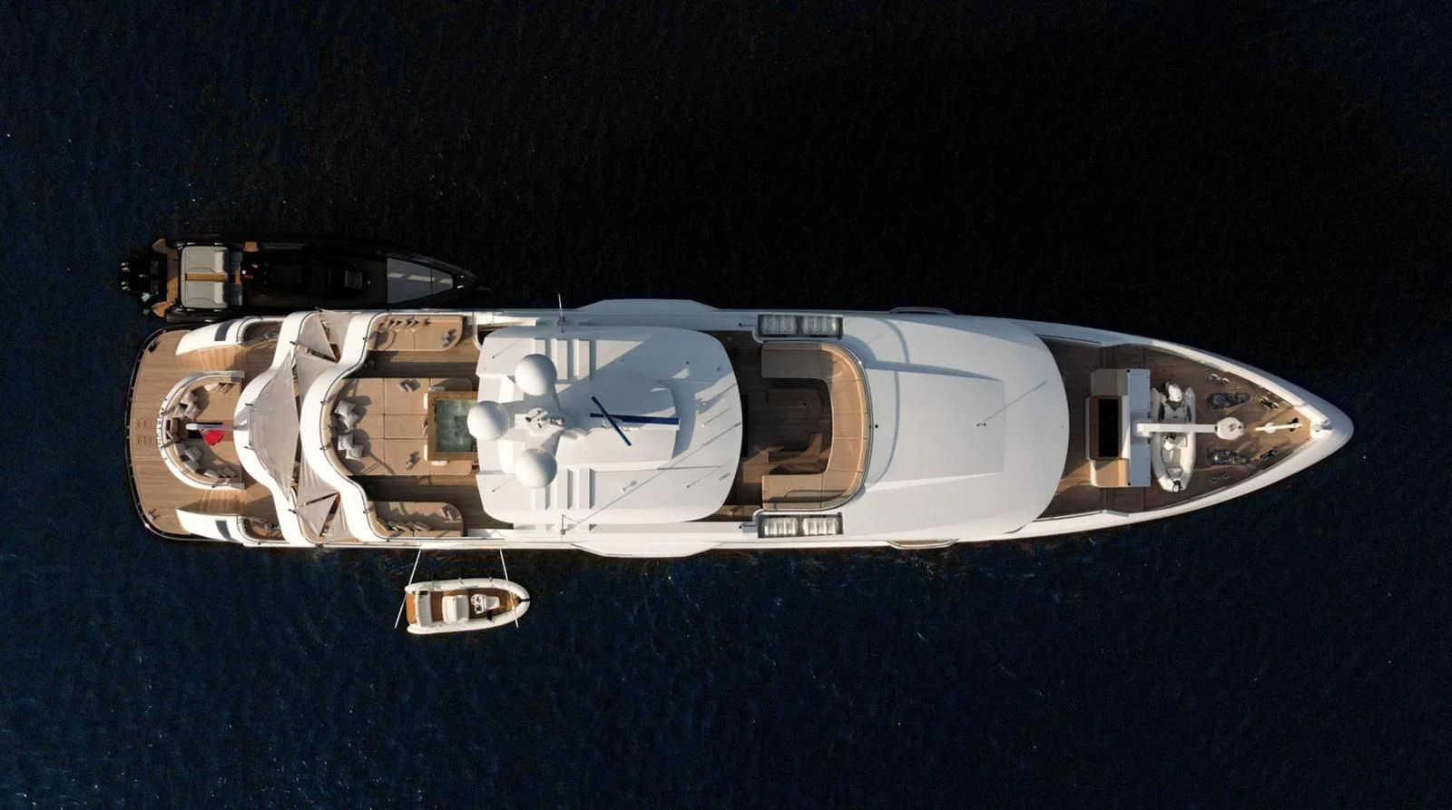 a silver and black vehicle aboard M 47 Yacht for Sale