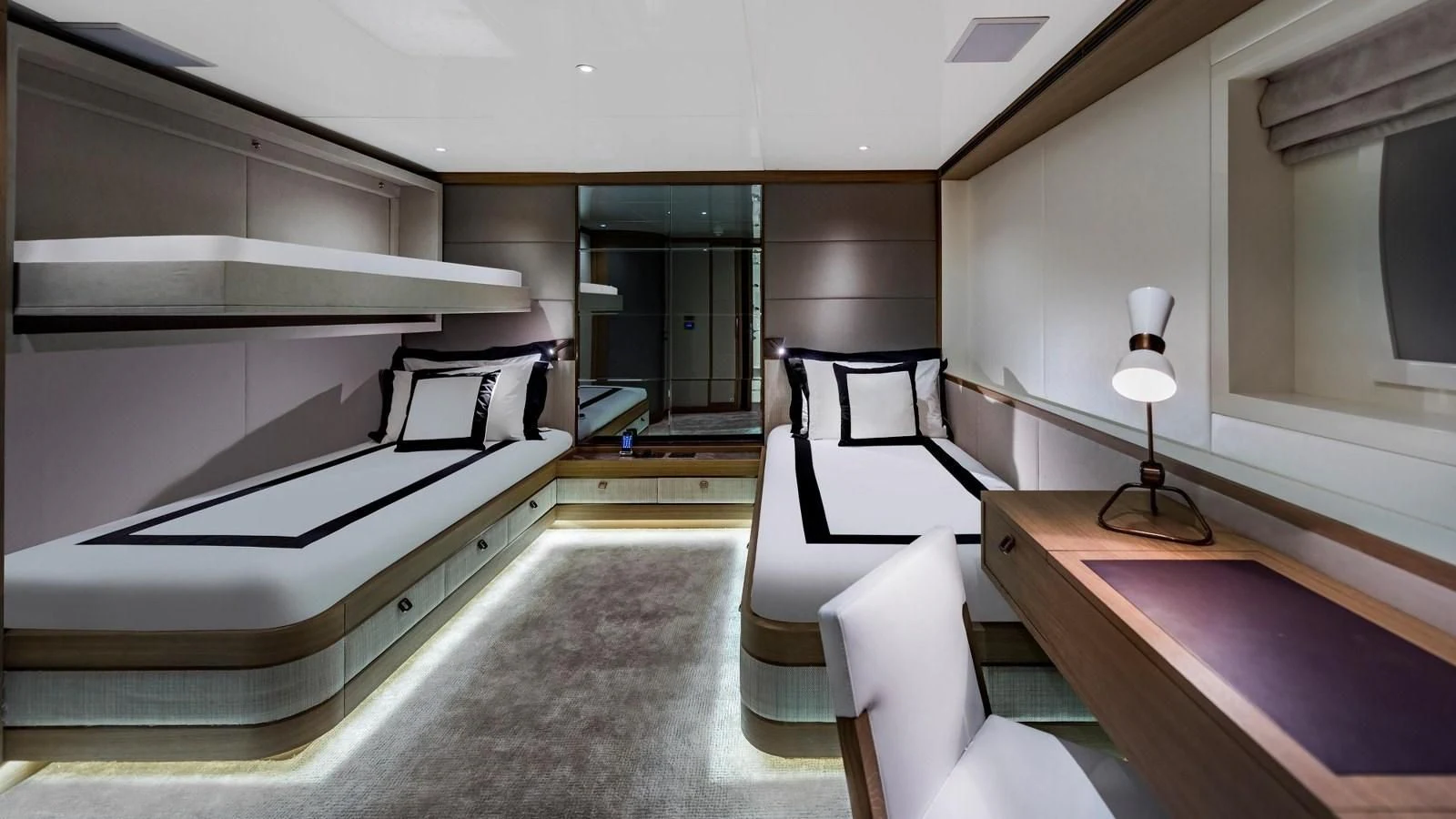 a room with a bed and a desk aboard M 47 Yacht for Sale