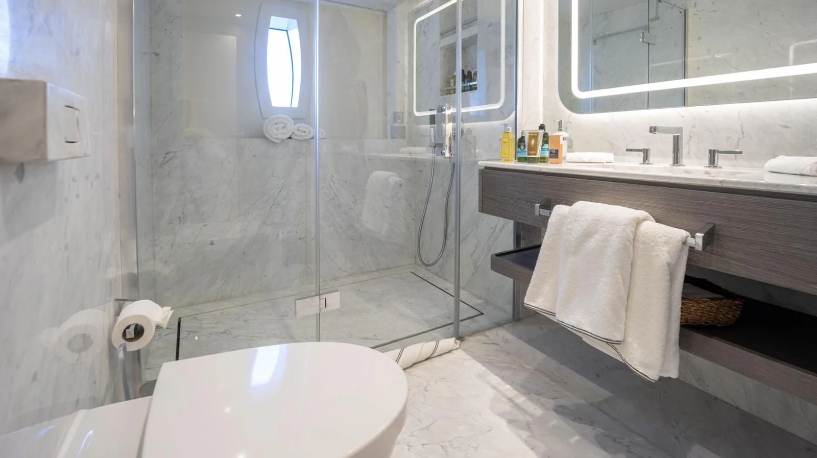 a bathroom with a sink and a mirror aboard M 47 Yacht for Sale