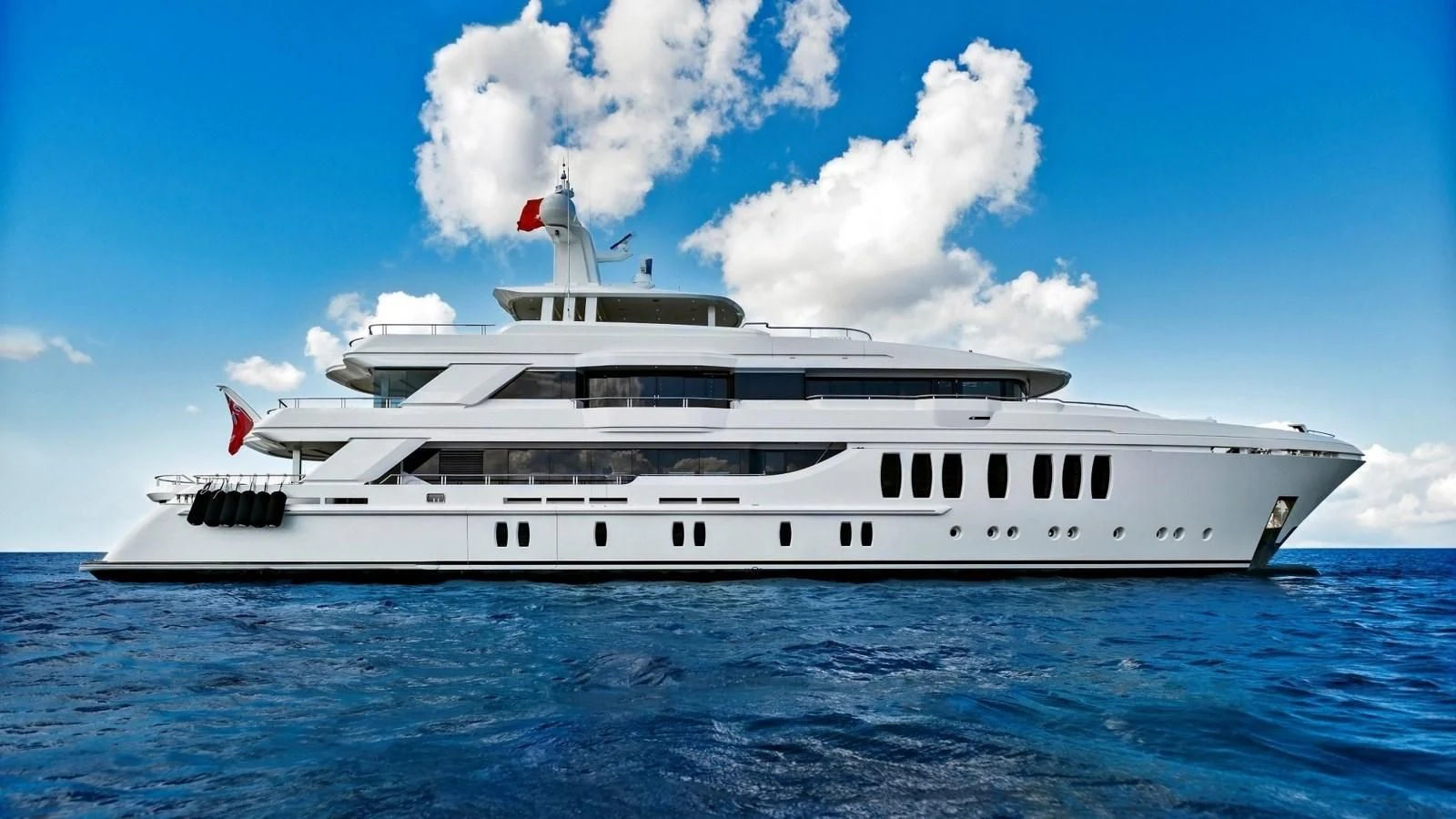 a large white ship in the water aboard M 47 Yacht for Sale
