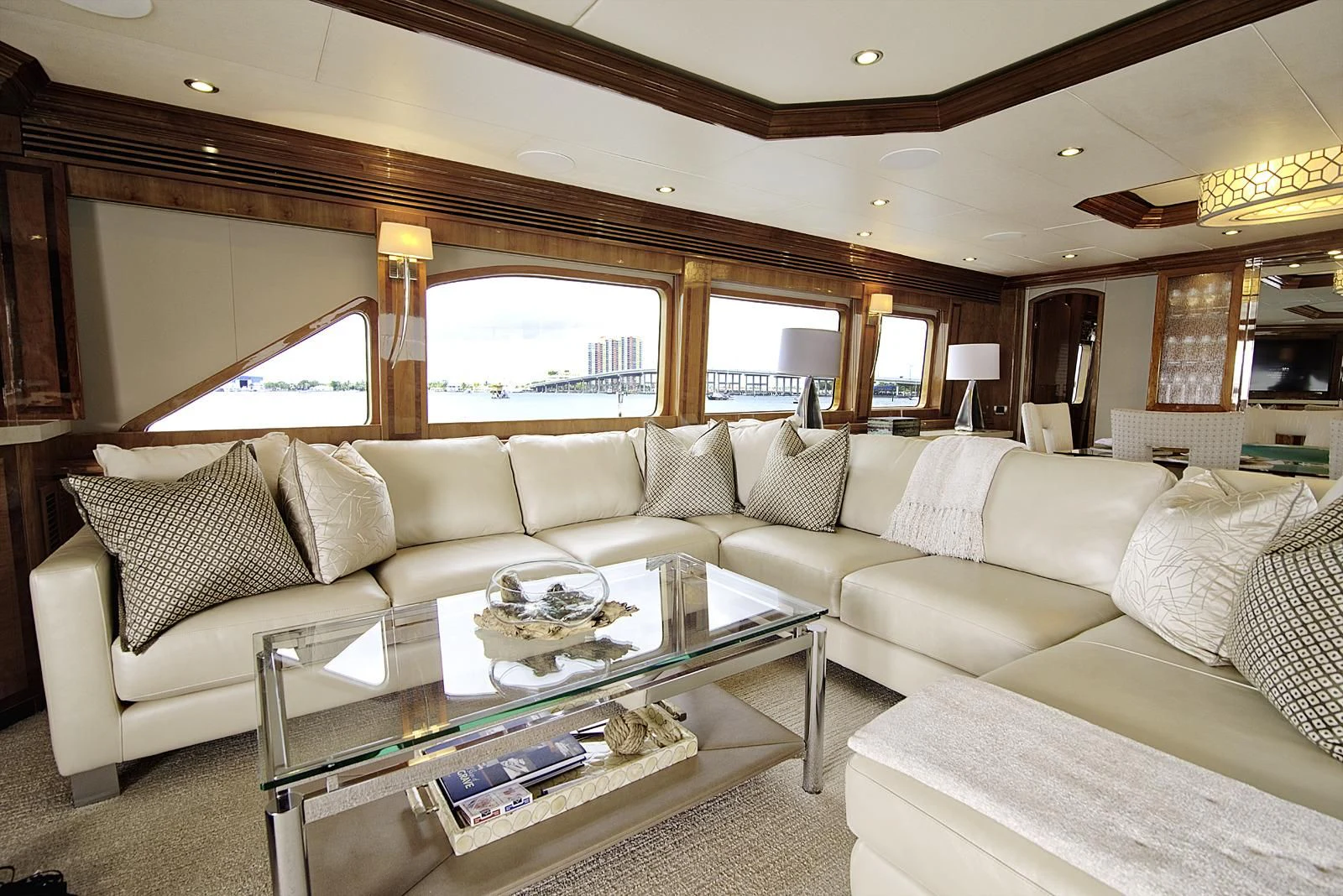 a living room with a large window aboard STERLING V Yacht for Sale