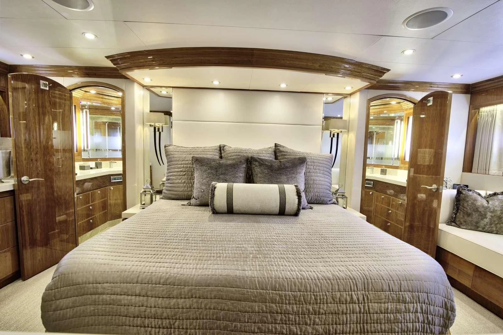 a large bed in a hotel room aboard STERLING V Yacht for Sale