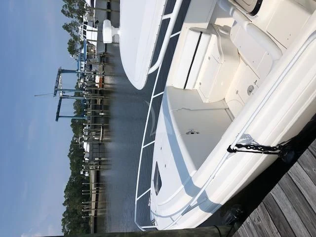 a white boat on the water aboard STERLING V Yacht for Sale
