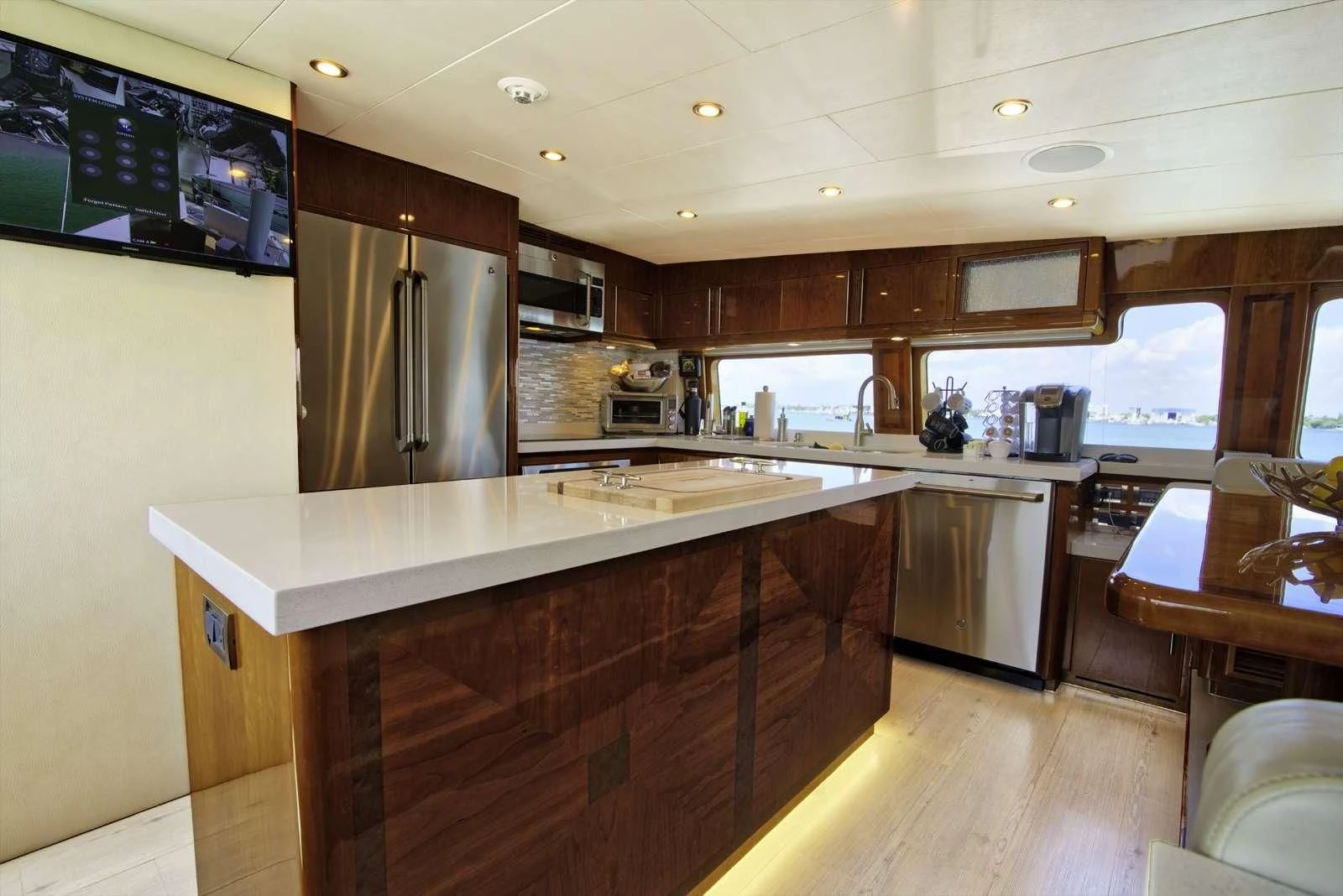 a kitchen with a large island aboard STERLING V Yacht for Sale