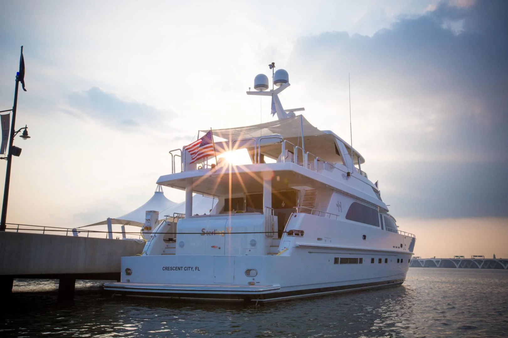 a large white boat on the water aboard STERLING V Yacht for Sale