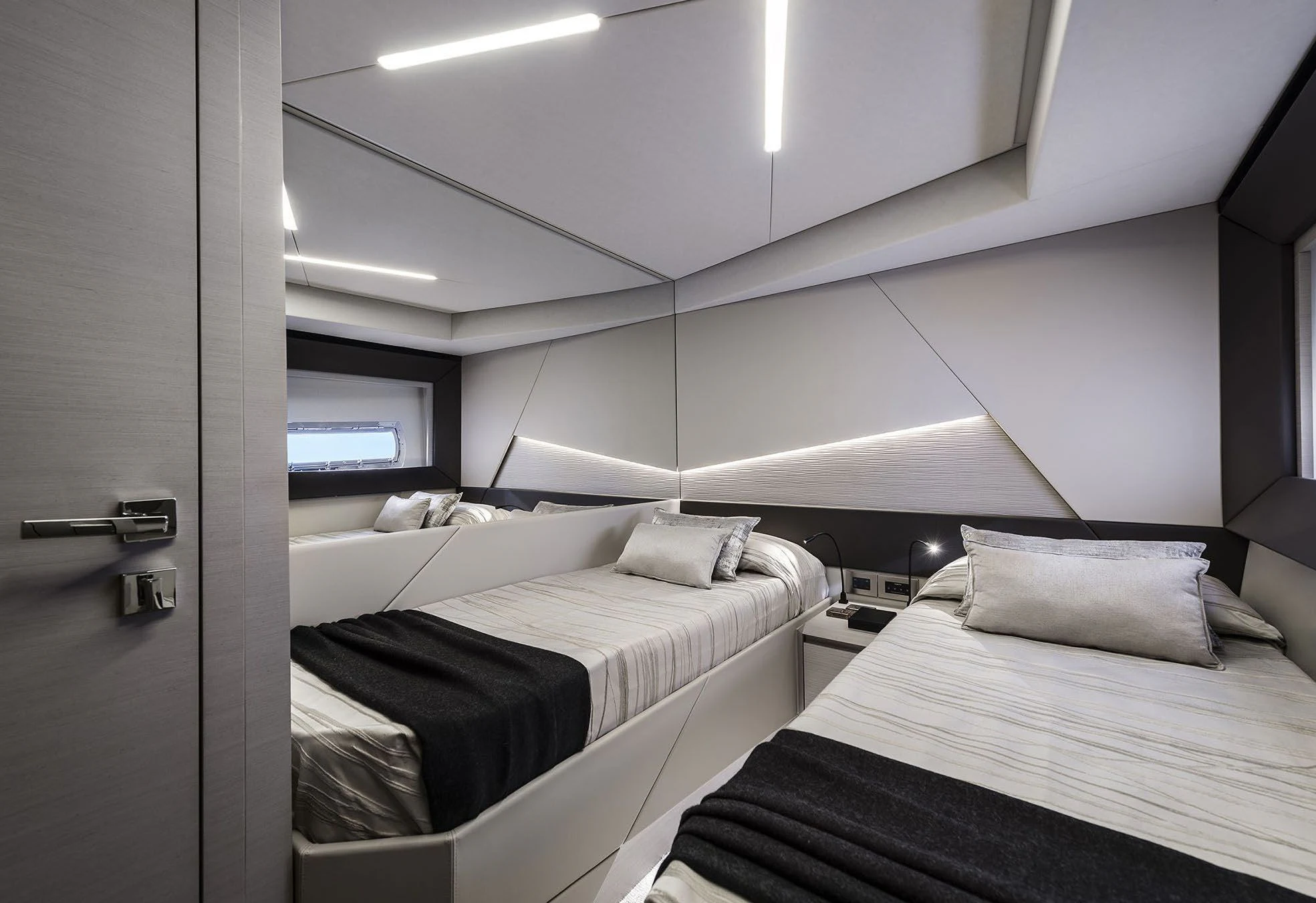 a couple of beds in a room aboard UNREEL Yacht for Sale