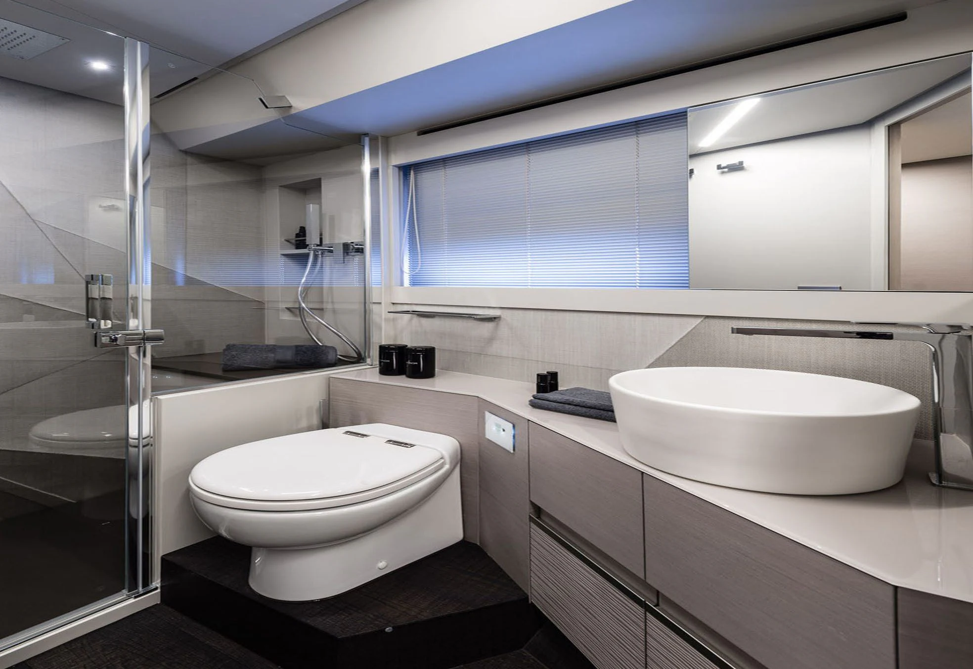 a bathroom with a glass shower aboard UNREEL Yacht for Sale