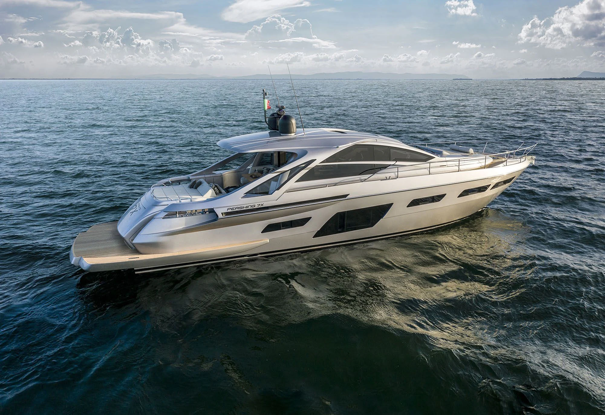 a white boat in the water aboard UNREEL Yacht for Sale