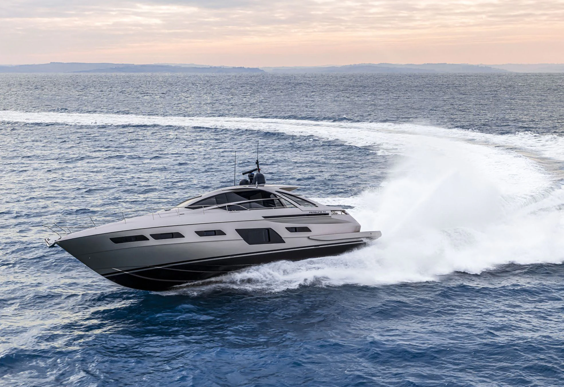 a white yacht in the water aboard UNREEL Yacht for Sale