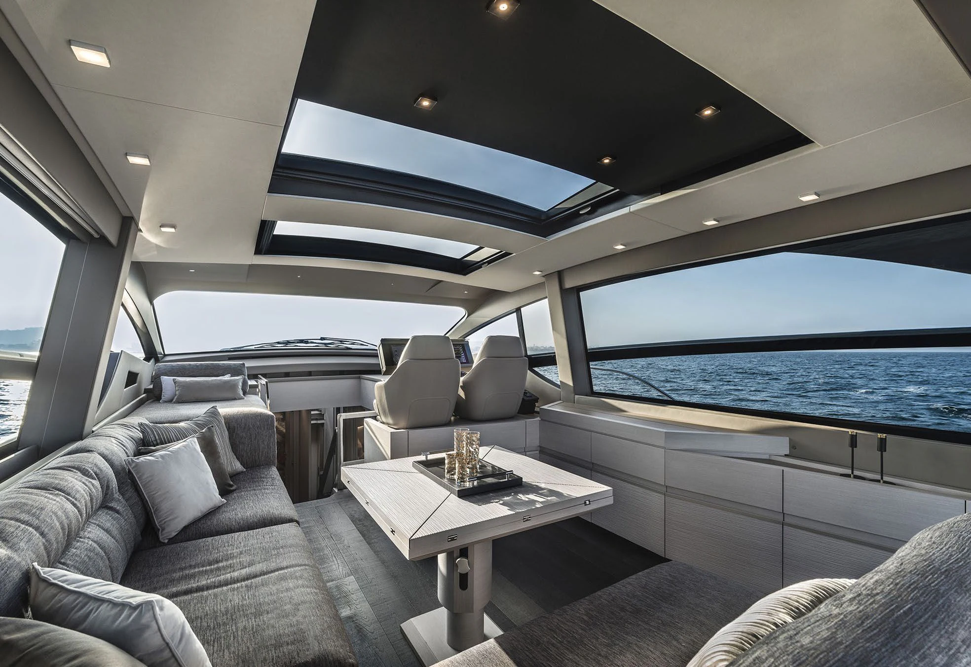 a boat with a table and chairs aboard UNREEL Yacht for Sale