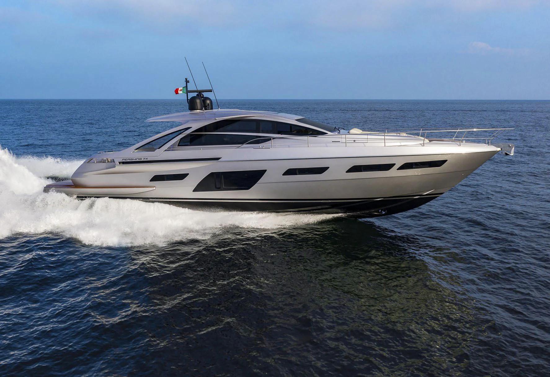 a white yacht on the water aboard UNREEL Yacht for Sale