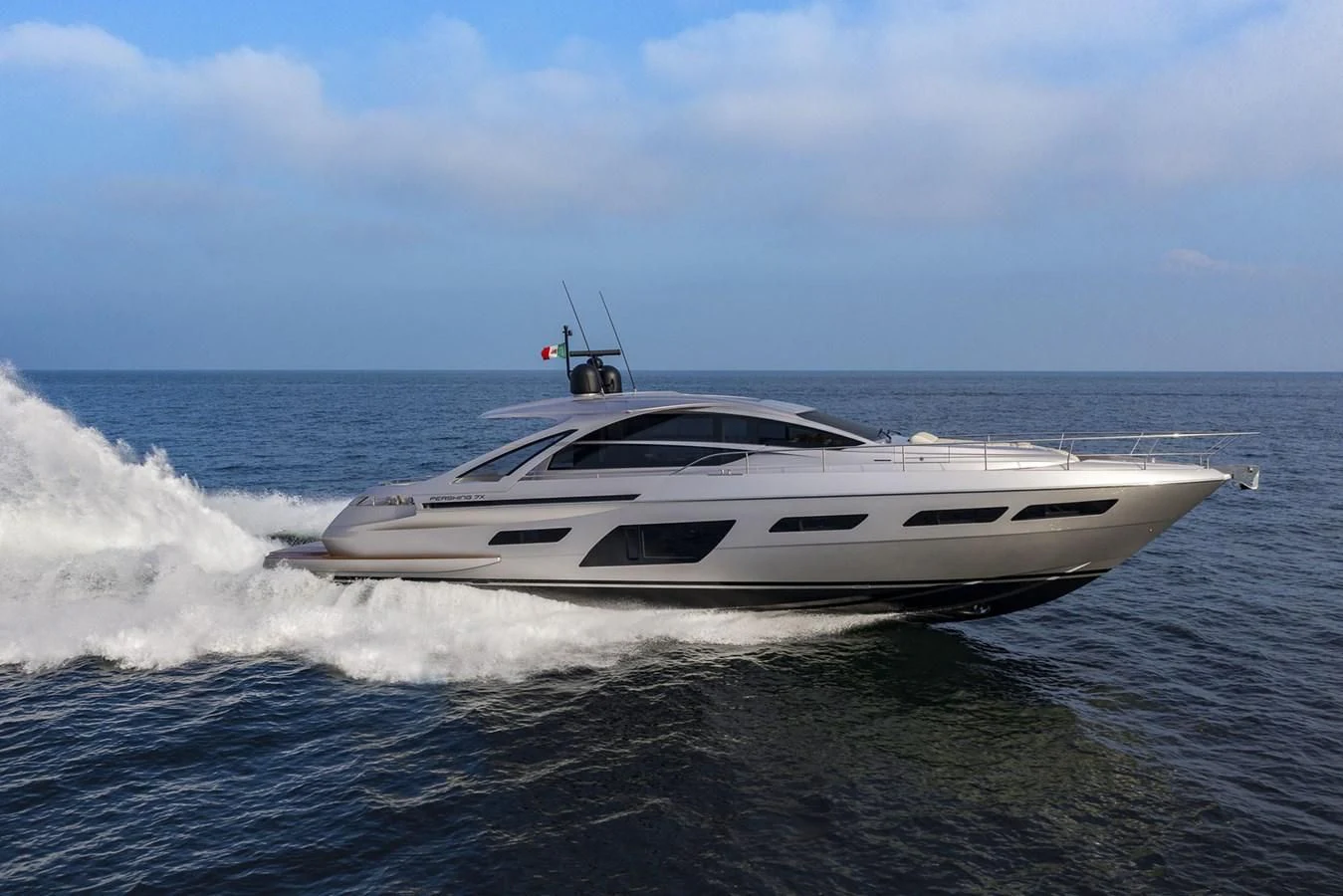 a white yacht on the water aboard UNREEL Yacht for Sale