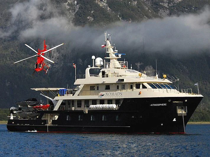 a large ship in the water aboard ATMOSPHERE Yacht for Sale