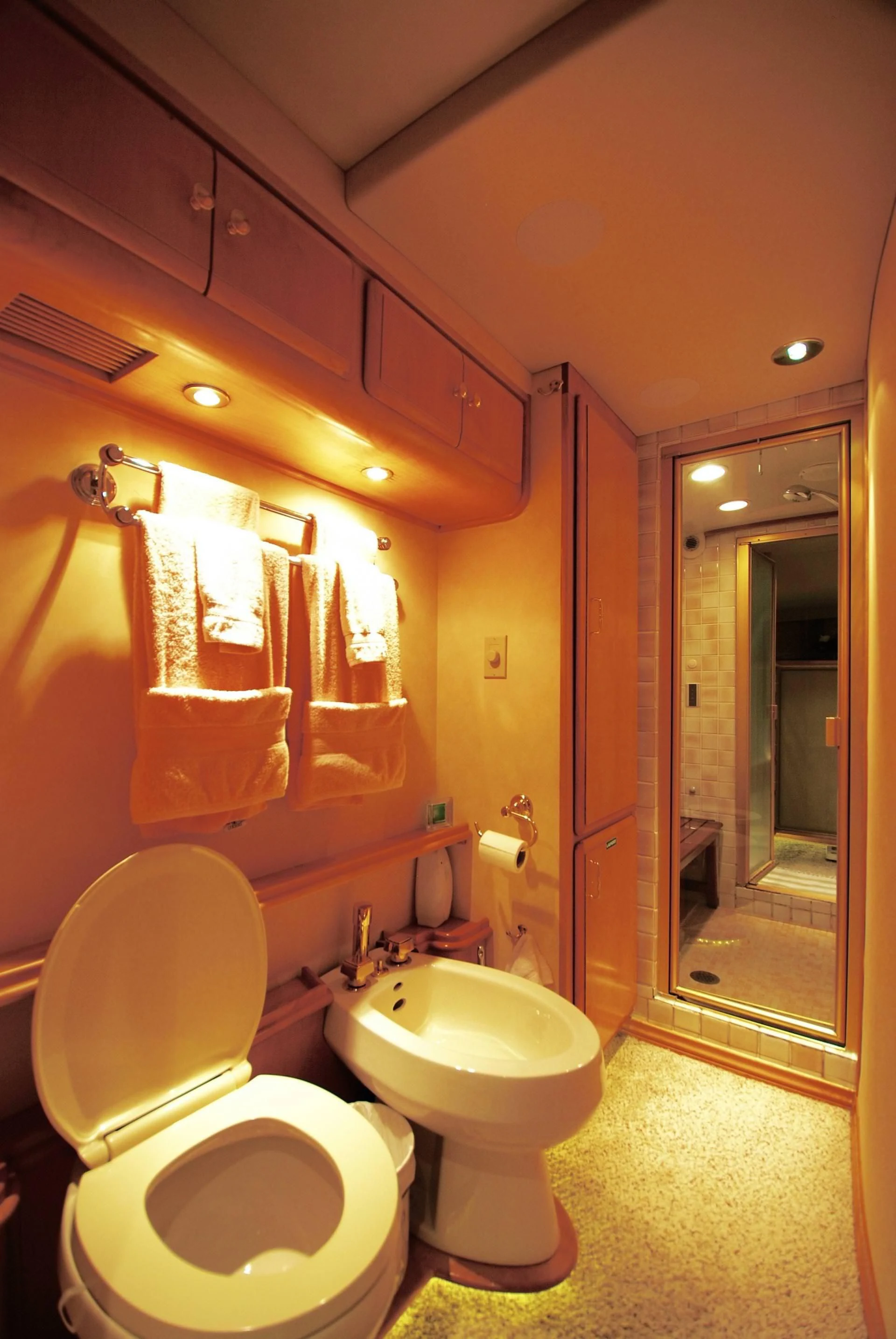 a bathroom with a toilet and sink aboard FORTY LOVE Yacht for Charter